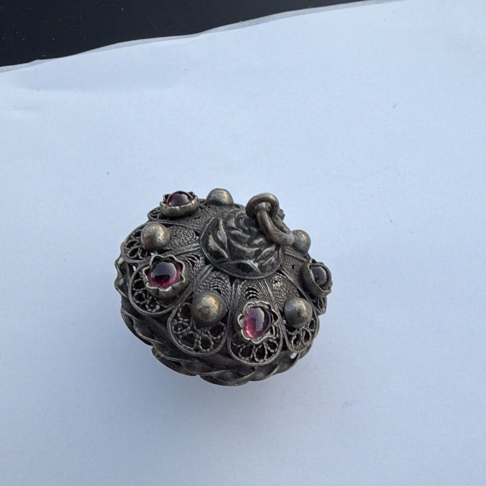 Antique filigree silver pomander bead with inset red glass stones